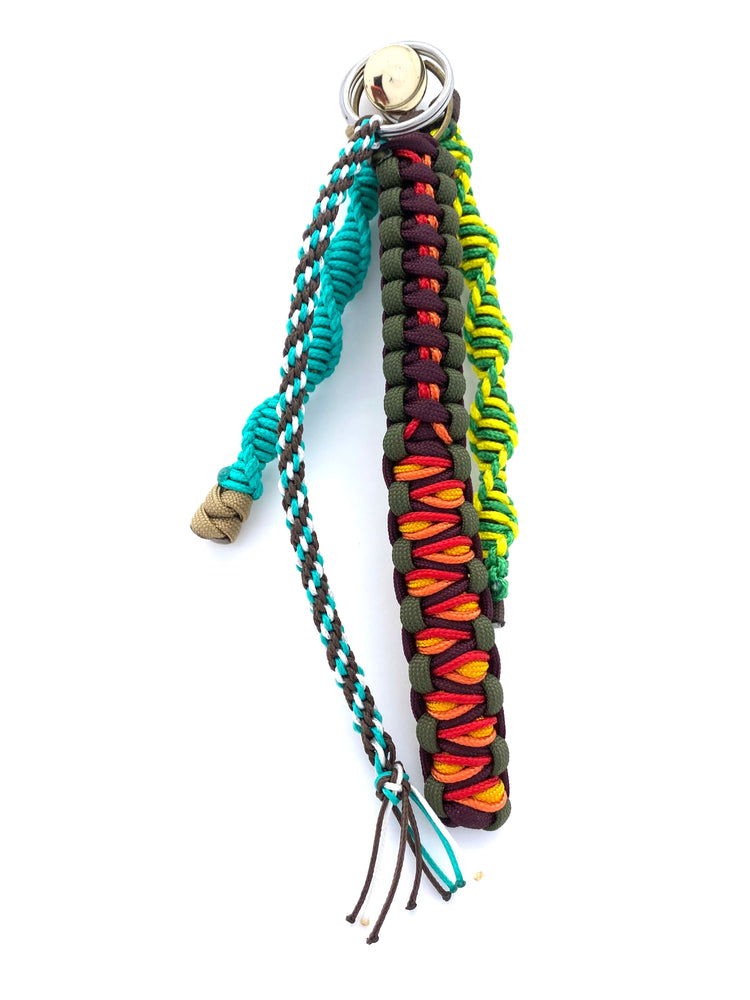 a bunch of key chains made with various types of paracord, microcord
