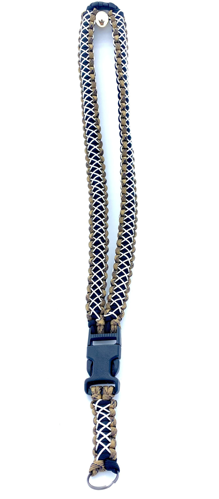 a cobra lanyard made with black and camo paracord and stitched with glow-in-the-dark microcord