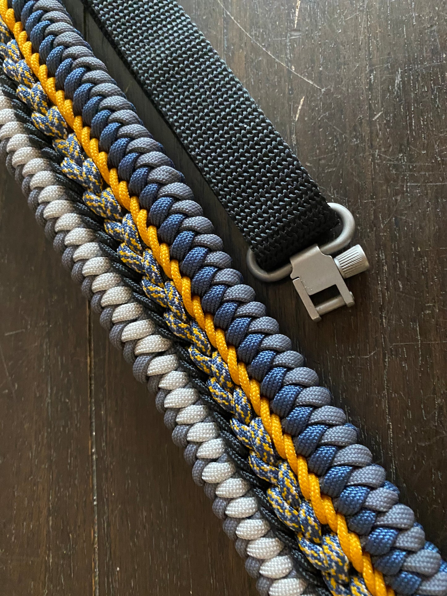 a fancy rifle sling crafted in the modified sanctified weave in Michigan colors