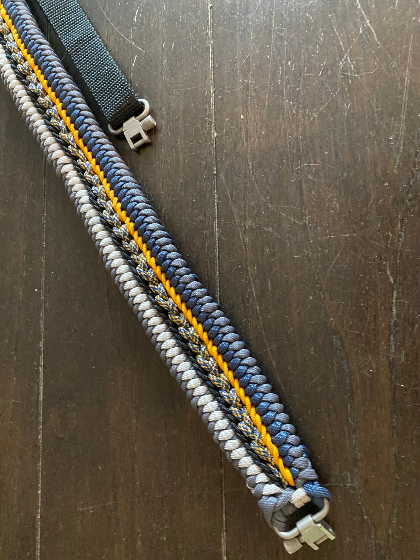 a fancy rifle sling crafted in the modified sanctified weave in Michigan colors