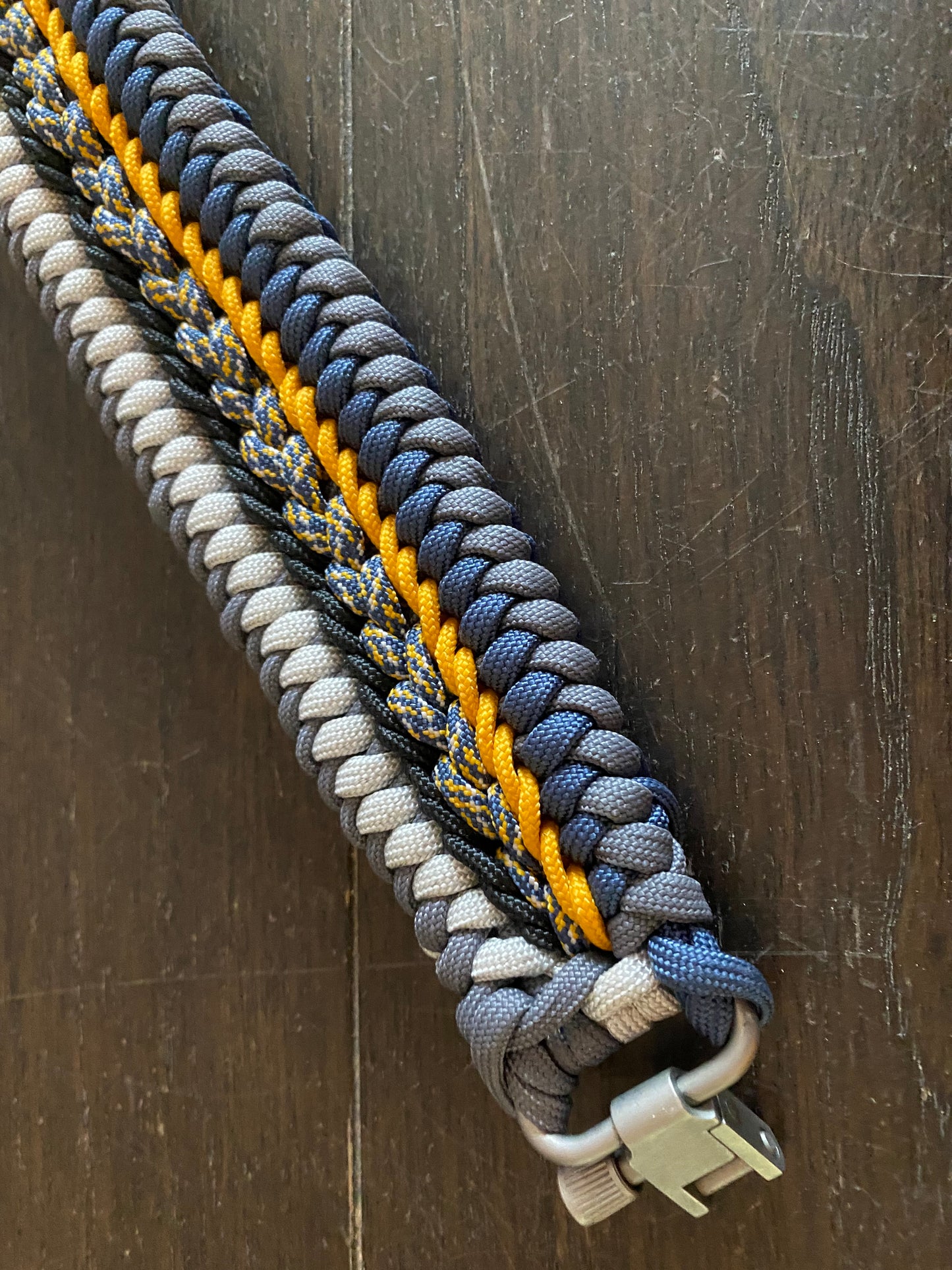 a fancy rifle sling crafted in the modified sanctified weave in Michigan colors