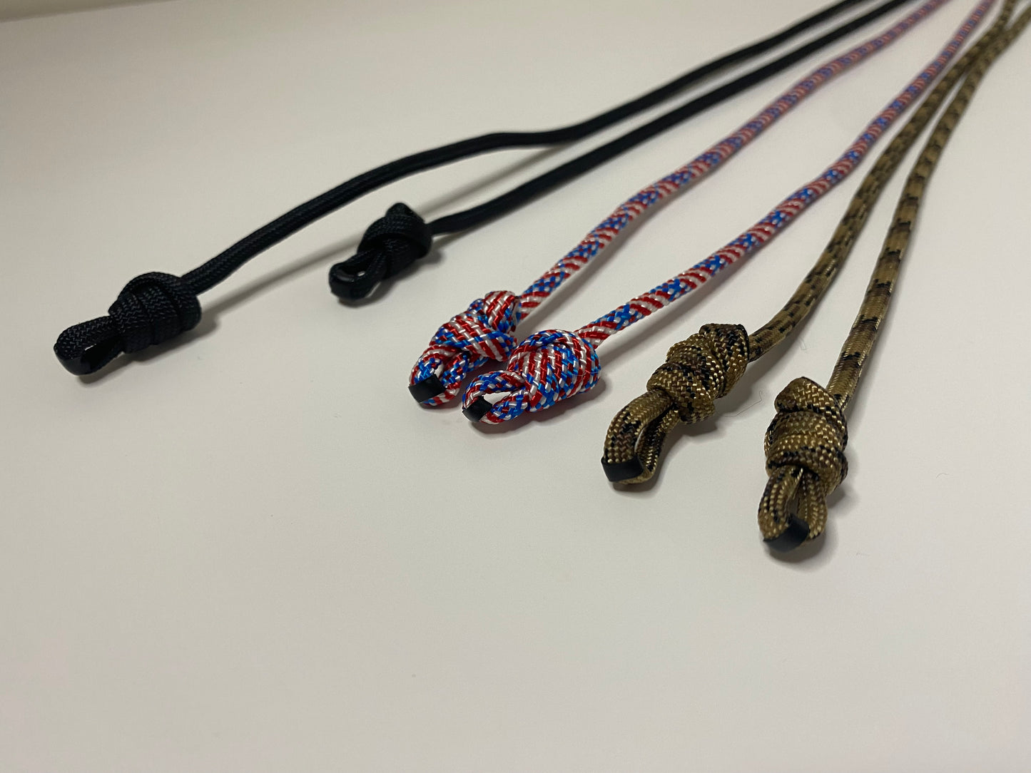 a bunch of eyeglass retainers made with 550 paracord.