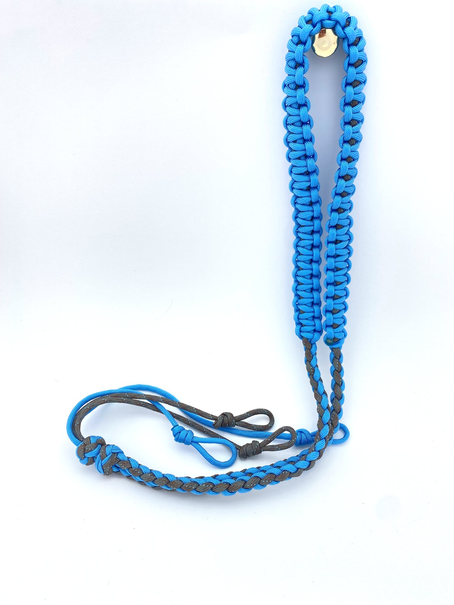 a 4 strand round braid game call lanyard finished with a cobra-woven neck band in Canis and blue 550 paracord
