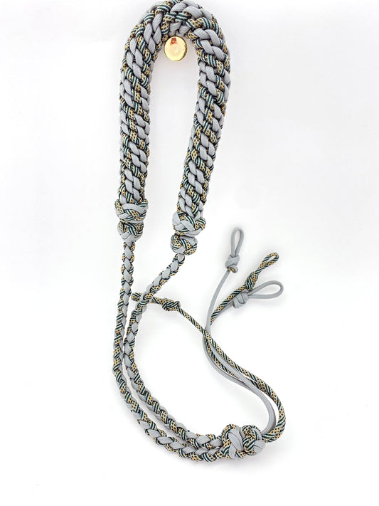 a 4 strand round braid finished with a Japanese round braid neck band and many footrope knots in Honor and gray 550 paracord