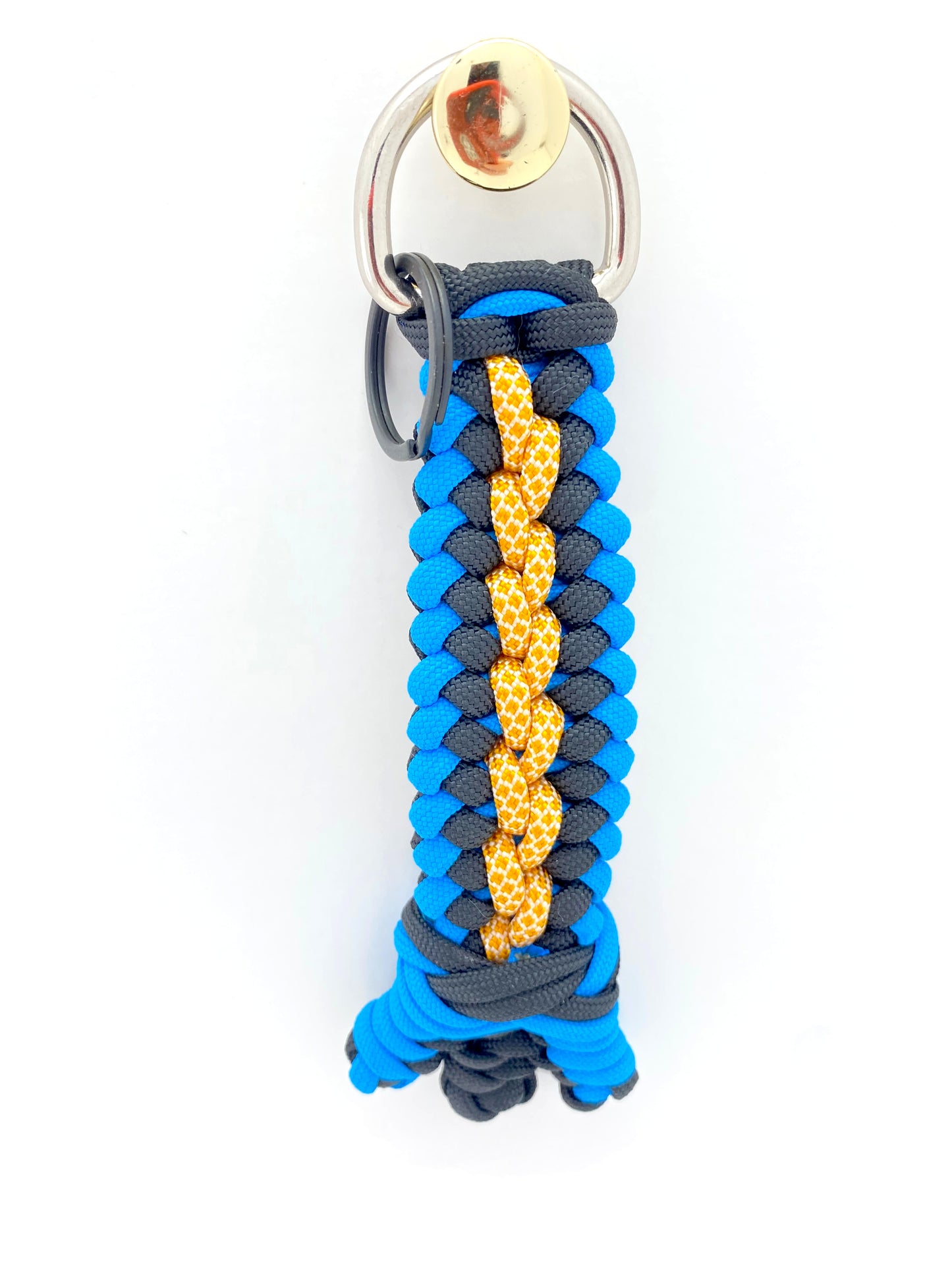 a modified sanctified woven key chain in blue, black, and honeycomb 550 paracord then finished with a footrope knot and snake knots