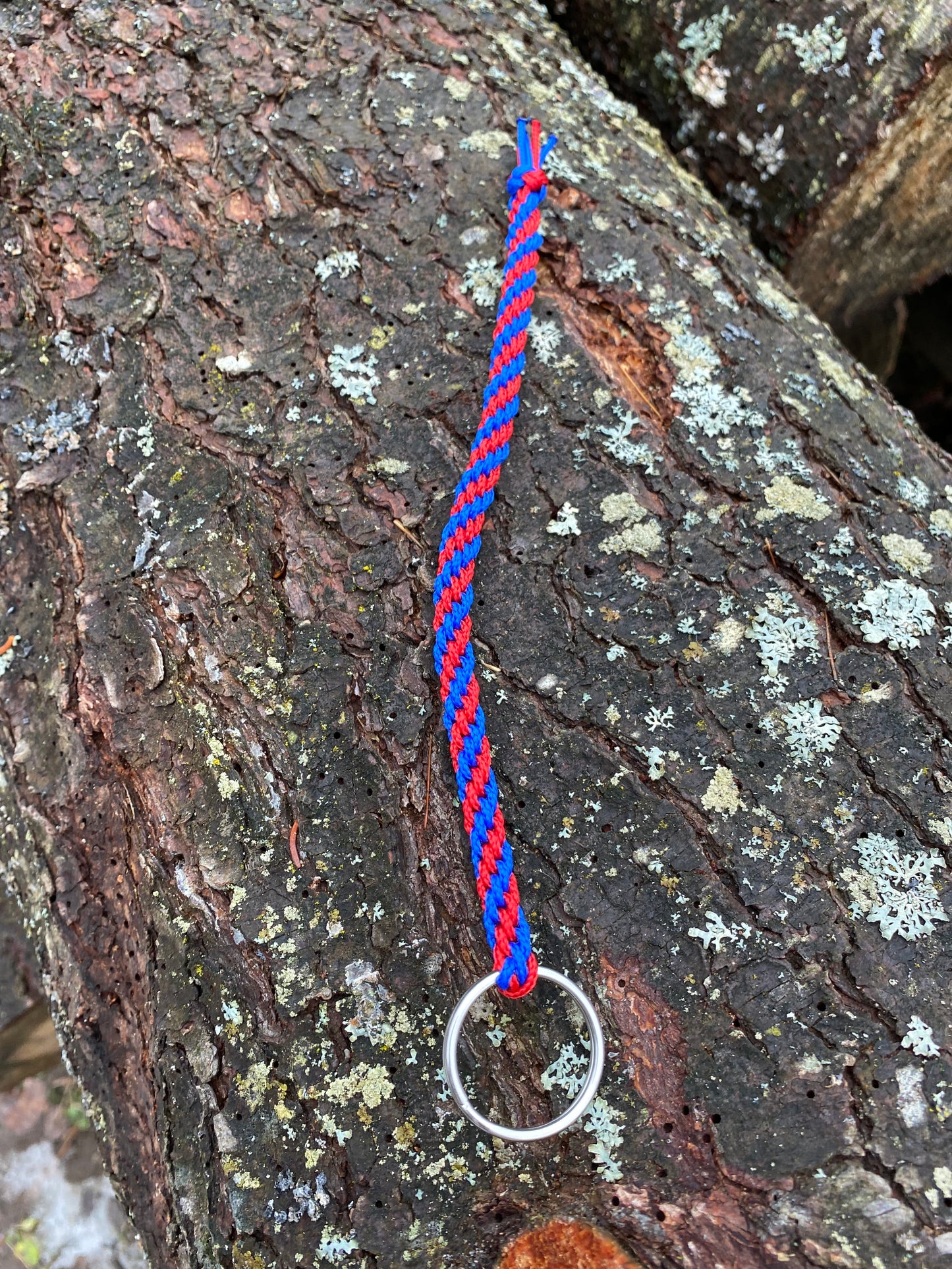 a Japanese round braid key chain made in red and ultramarine blue 95 cord