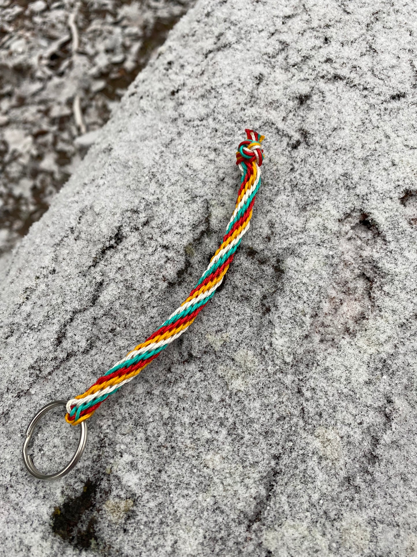 a Japanese round braid key chain crafted in microcord and finished with a footrope knot