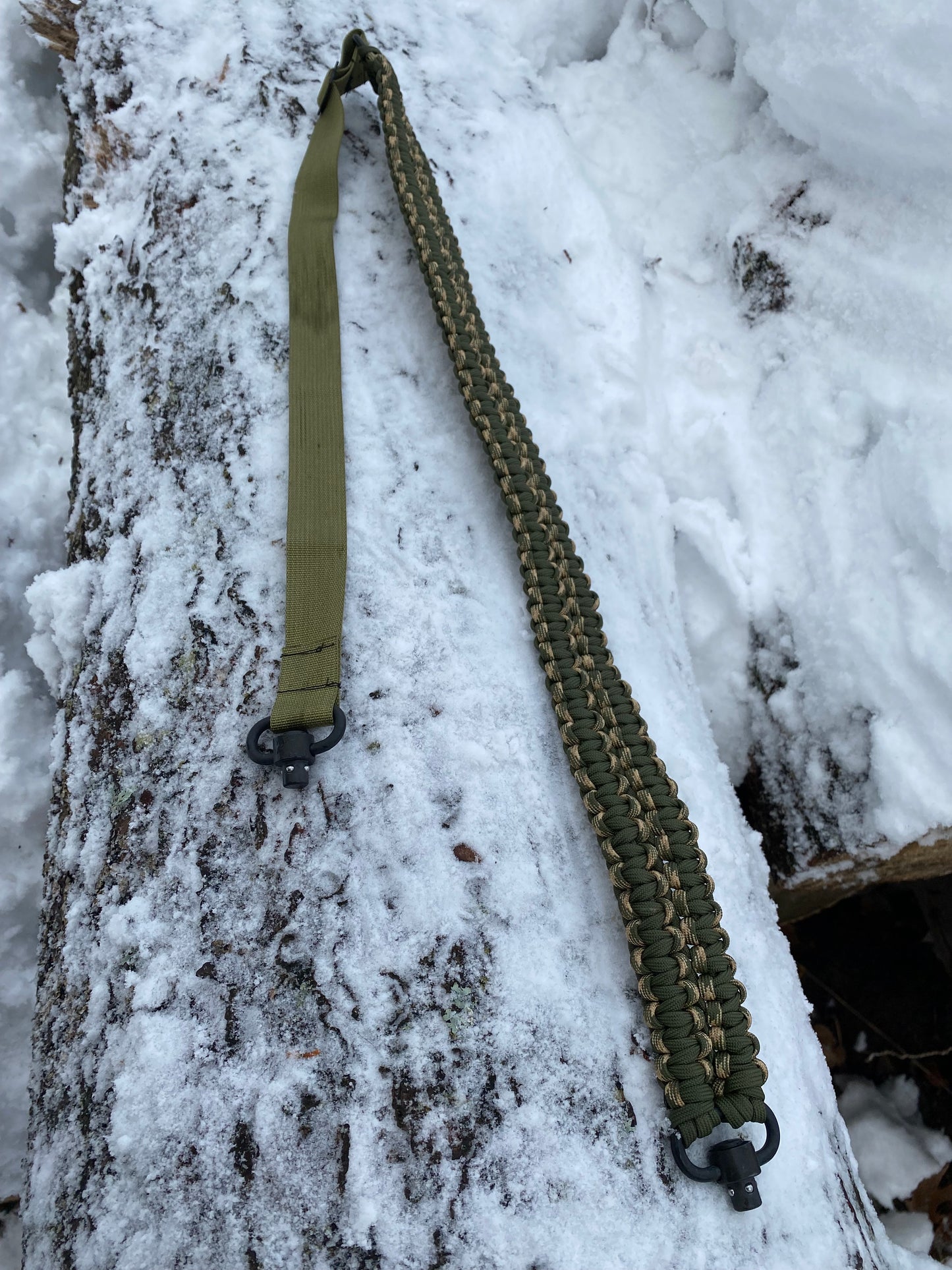 an adjustable rifle sling made with the mated cobra weave in olive drab and camo with QD rifle sling connectors.