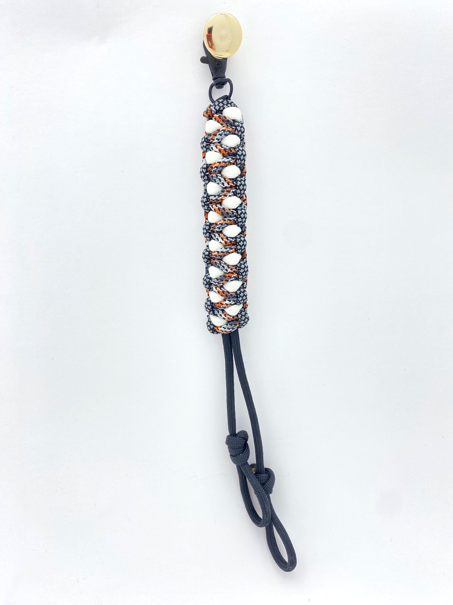 a clip with two additional loops for a game call lanyard
