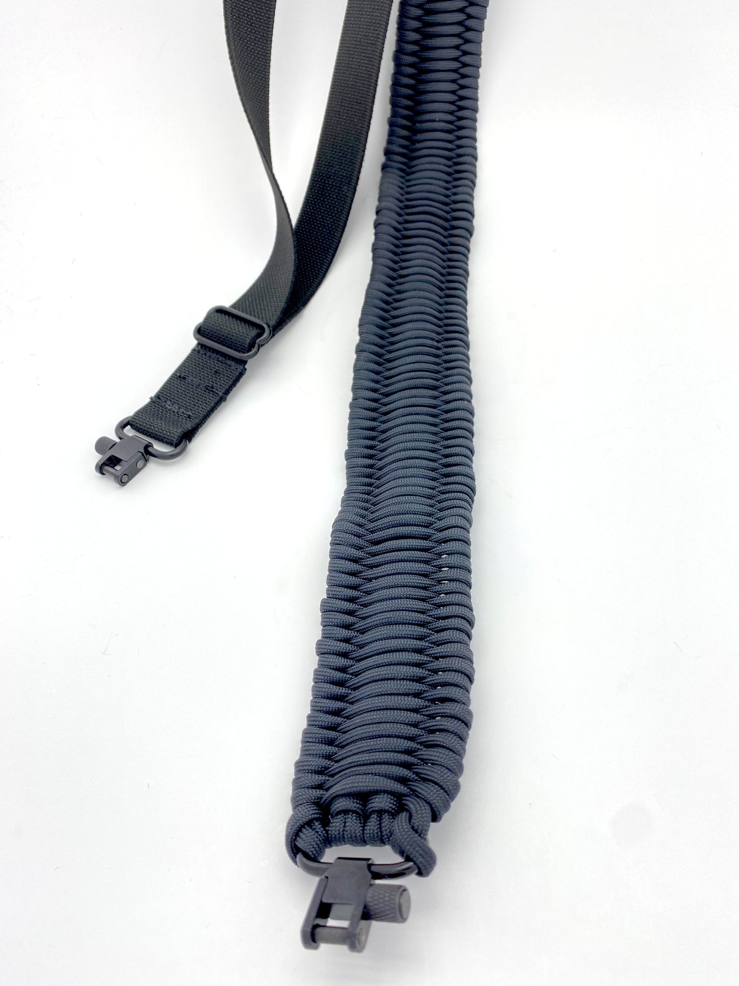 an all-black paracord rifle sling