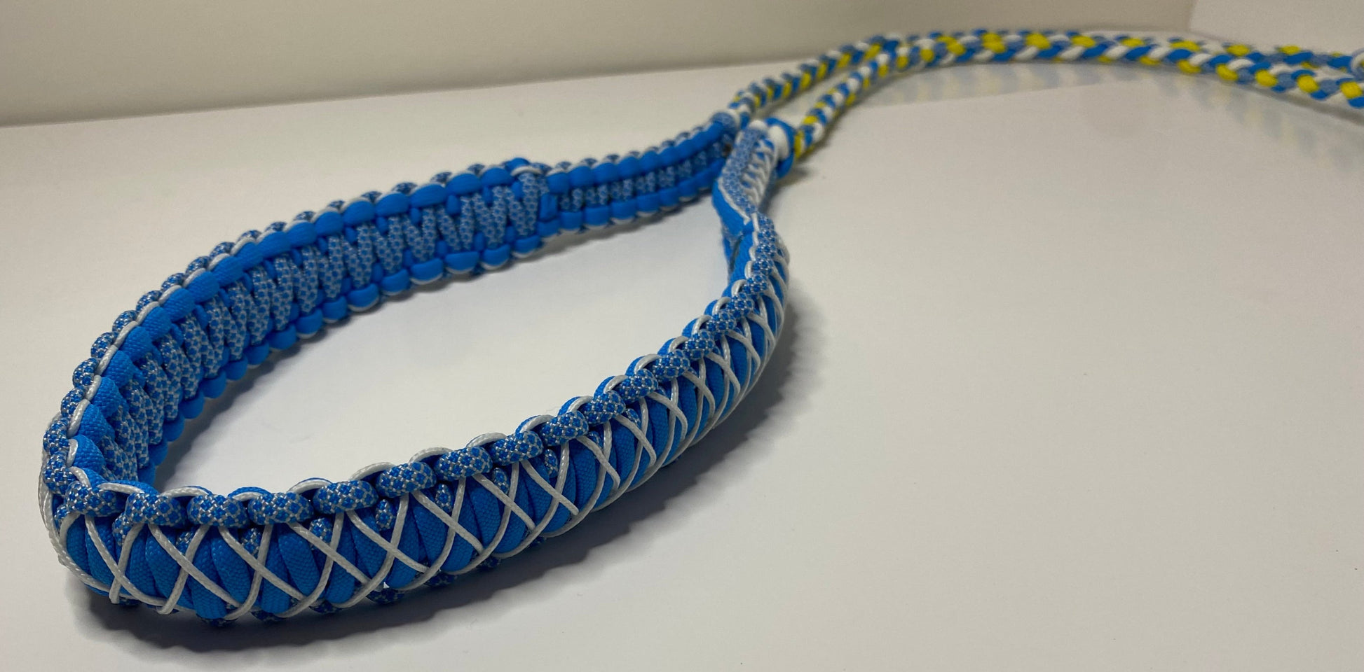 Stitched binocular lanyard made out of paracord