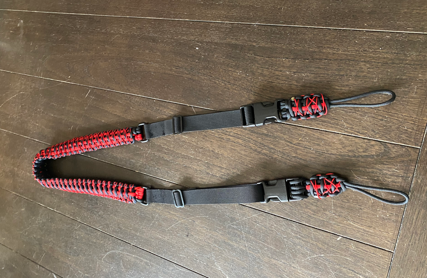 Adjustable Paracord Double Cobra Shoulder Bow Sling, Black and Red with Red Herringbone Stitching and 550 Middle